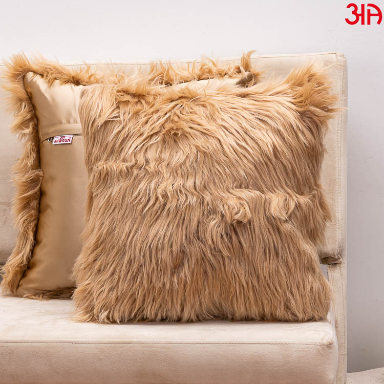 beige furry cushion