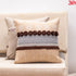 brown pompom cushion
