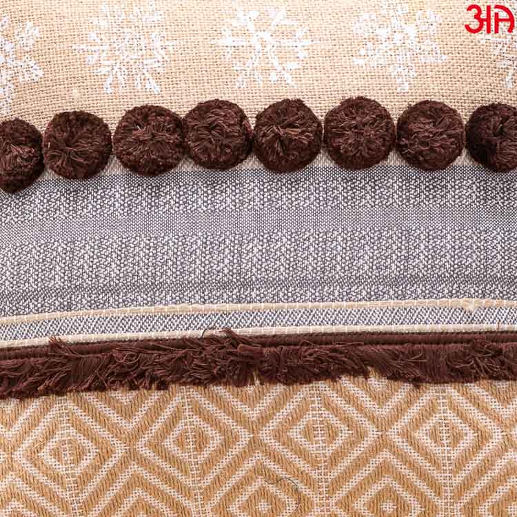brown pompom cushion3