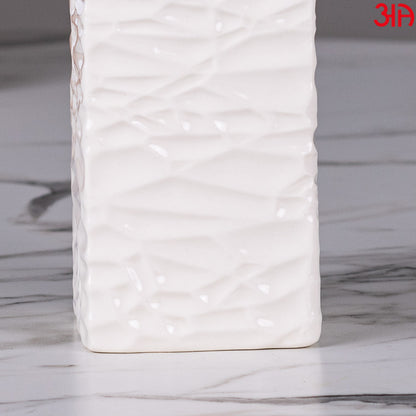 white ceramic soap dispenser with pump3