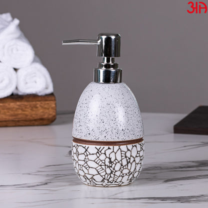 off white ceramic oval soap dispenser