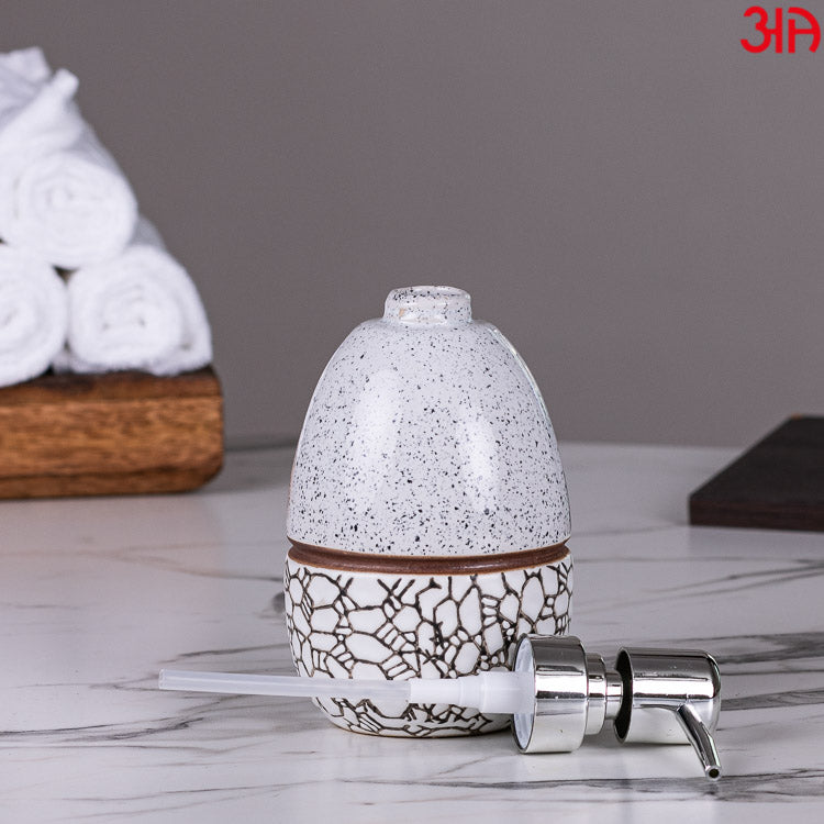 off white ceramic oval soap dispenser4