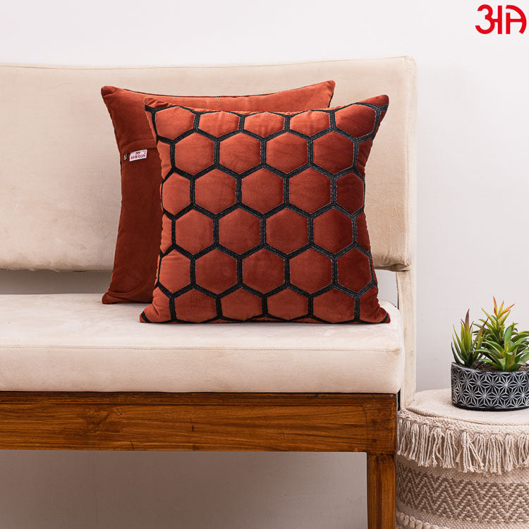 hexagon zari embossed cushion rust2