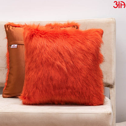 orange furry cushion