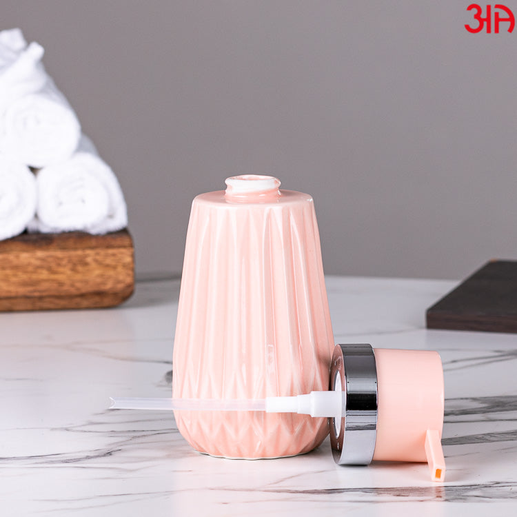 pink stripe soap dispenser