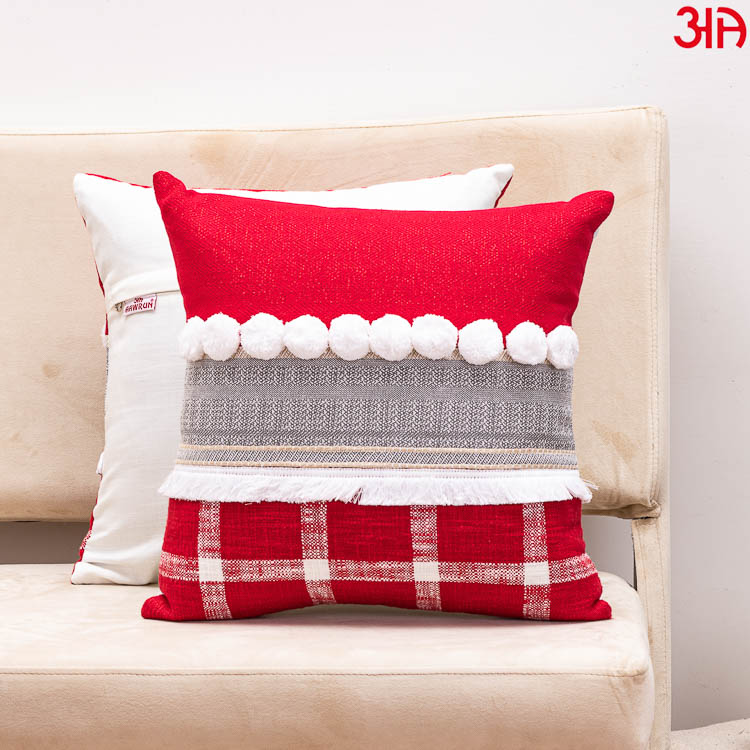 red-white pompom cushion