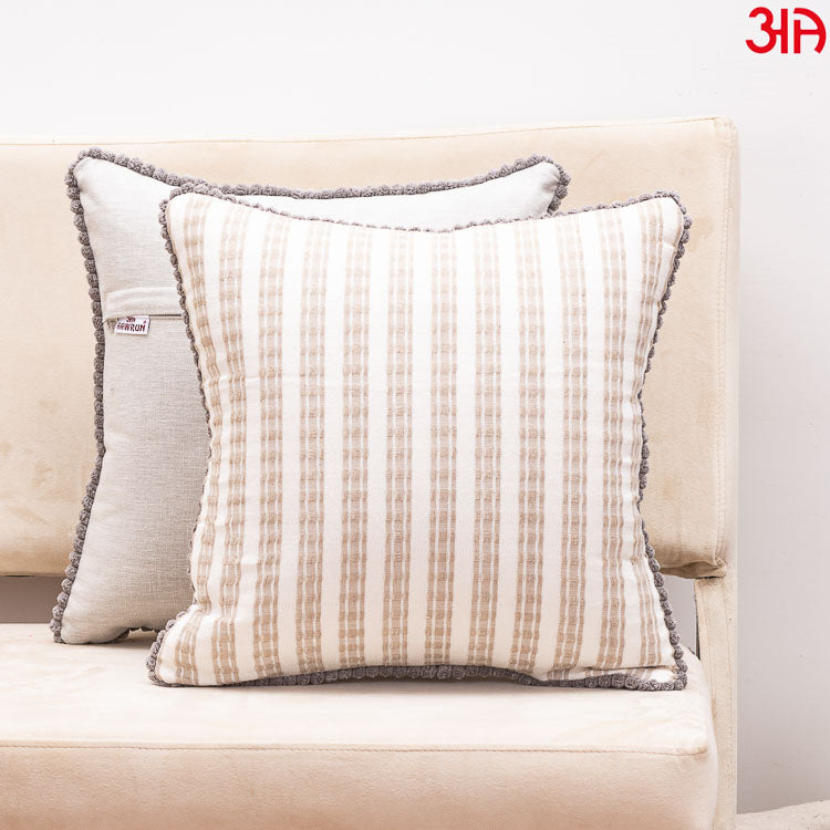 white brown cotton cushion