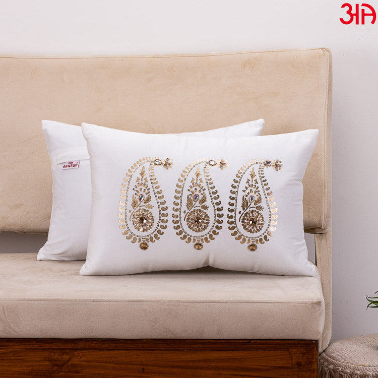 white paisley design cushion