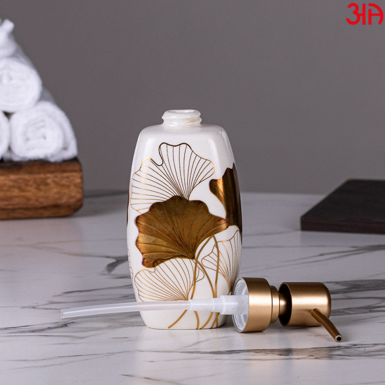 white golden ceramic soap dispenser