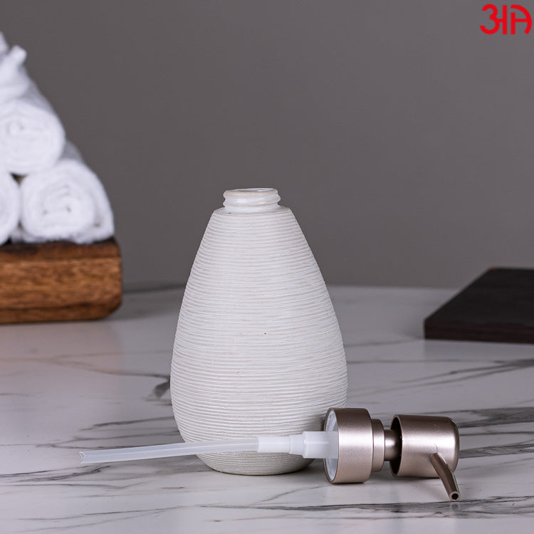 white pottery design brown ceramic dispenser