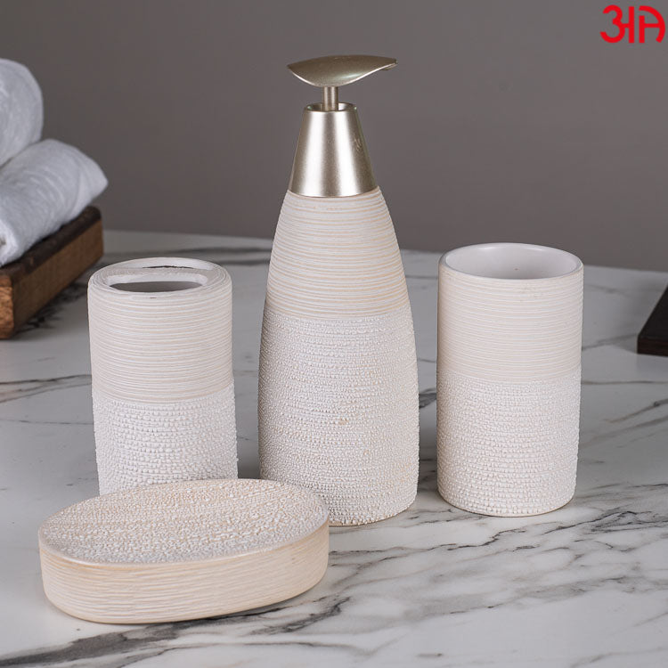 white stone finish dispenser set