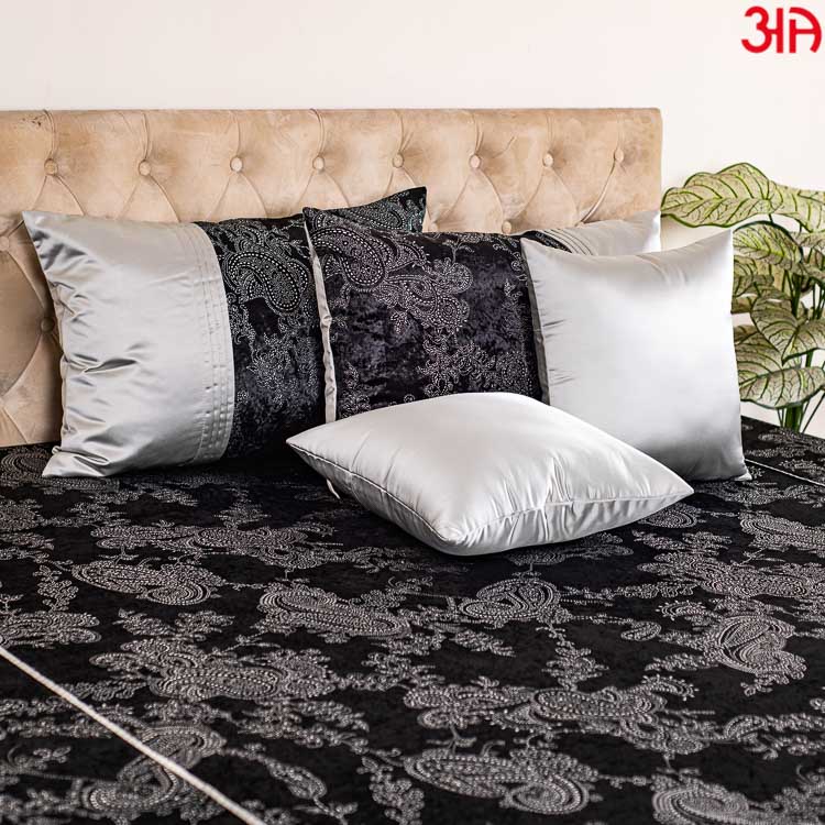 Black king size bedcover in pasley design