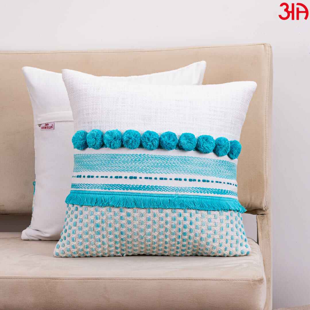 aqua blue pompom cushion