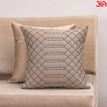 Geometric pattern beige cushion