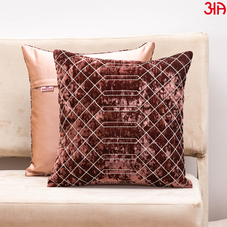 rust crochet textured cushion