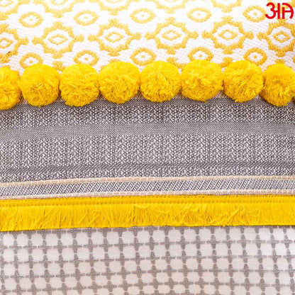 yellow pompom cushion3